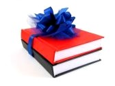 256131-two-books-wrapped-with-a-blue-ribbon-on-white-background
